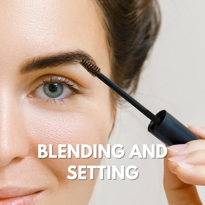 Blending eyebrow with clean mascara