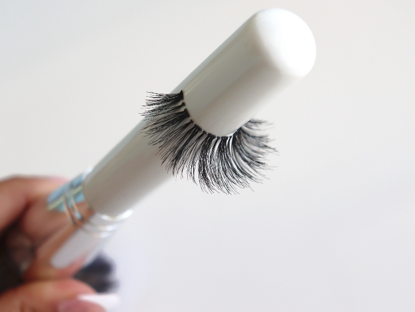 Modelrock eyelashes wraped up around makeup brush - Lash Hack