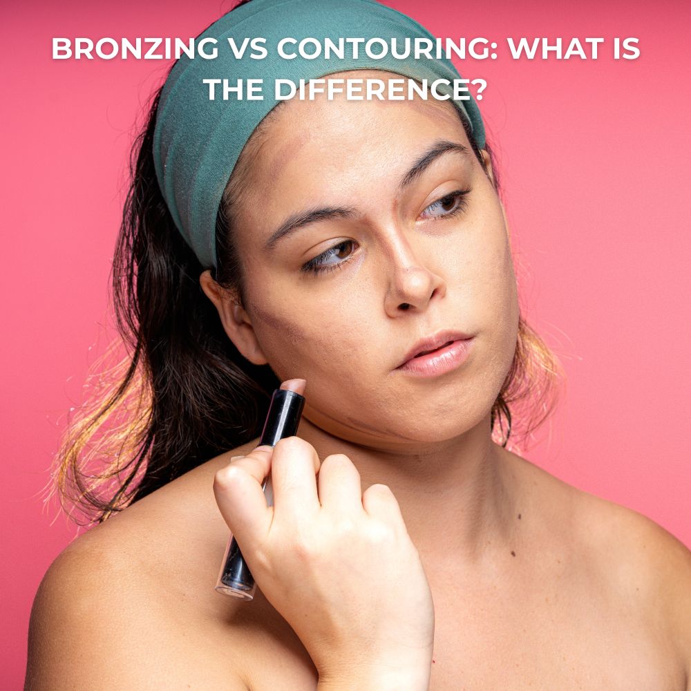 Lady applying bronzer to her face