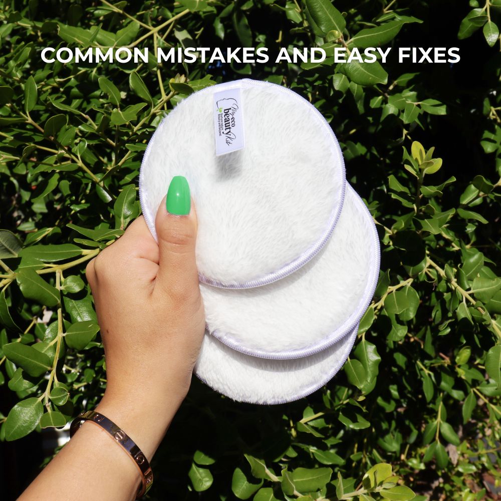 Hand holding 3 eco friendly makeup remove pads.
