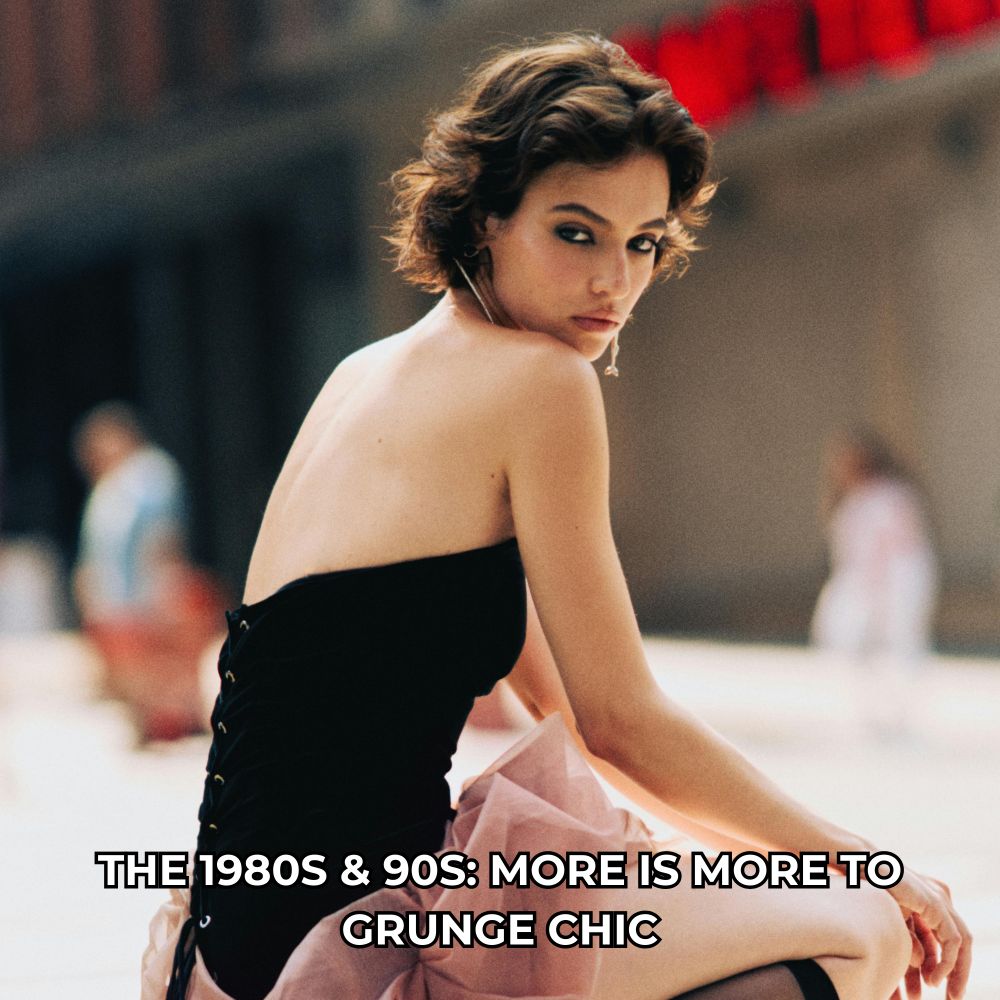 Model with black dress on and looking back