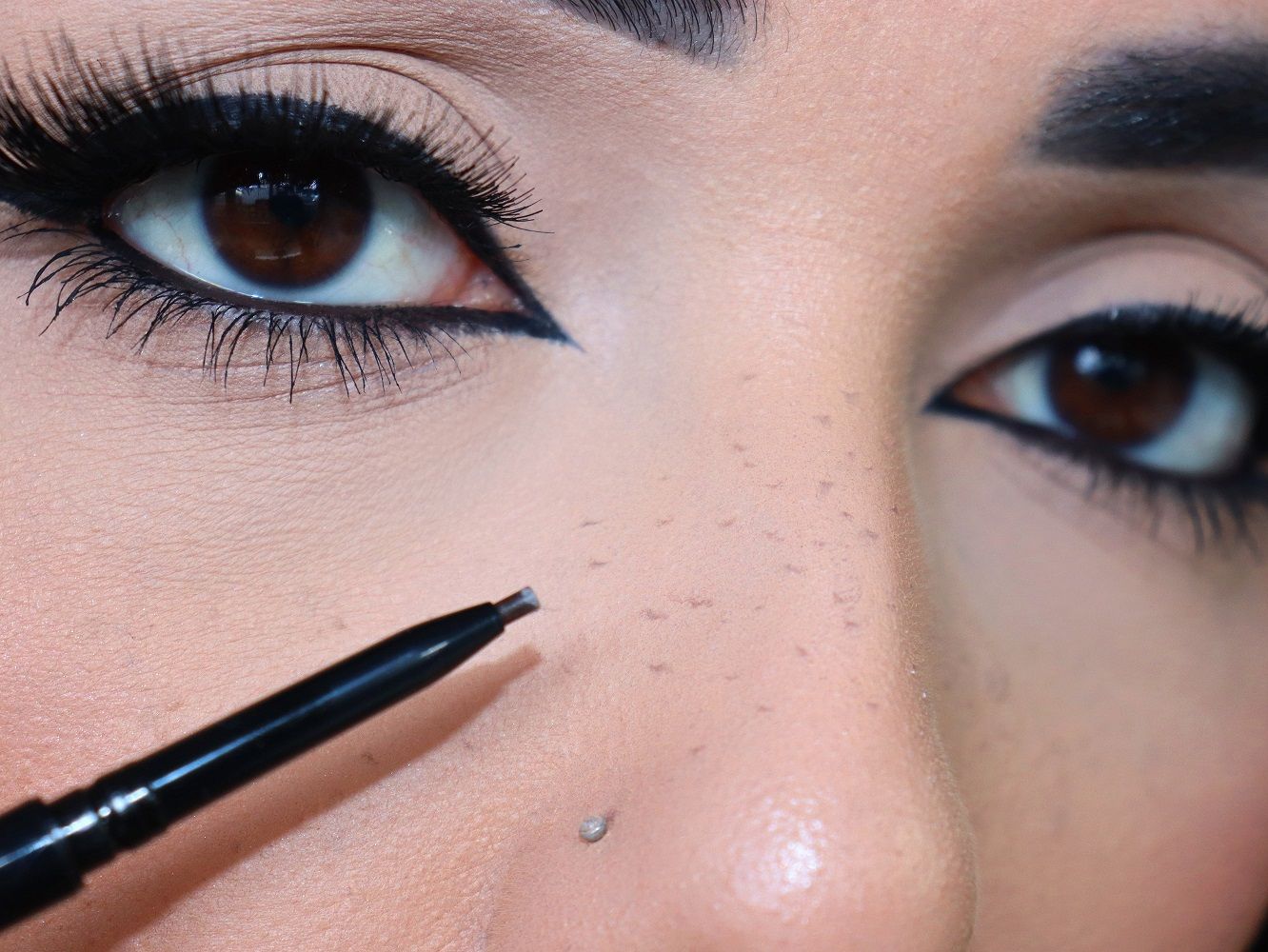 DOT FRECKLES ACROSS THE FACE
