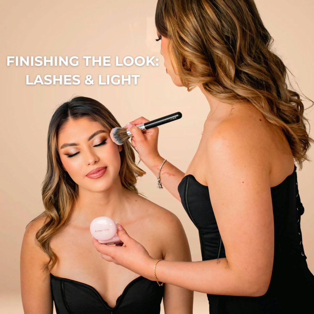 Makeup artist applying makeup on ladies face