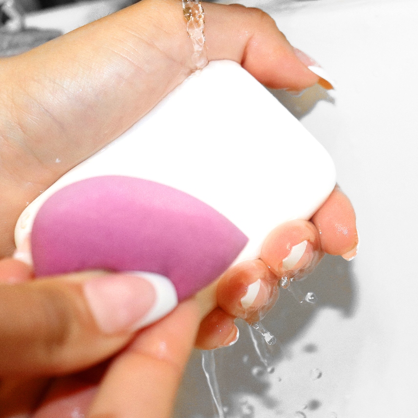 washing beauty blender with soap